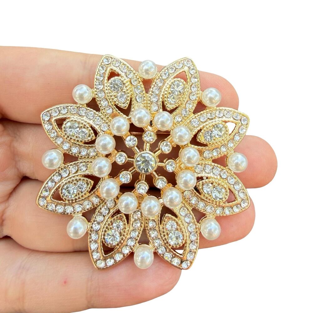Monet Snowflake Brooch: Gold-Tone Crystal  Pearl Holiday Pin Rhinestone Snowflak